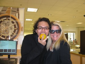Macy's employees go for world orange-eating record.